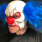 Full head scary clown mask with blue hair.