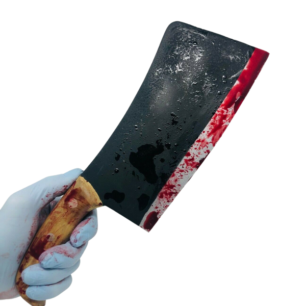 fake blood covered meat cleaver. Foam movie prop